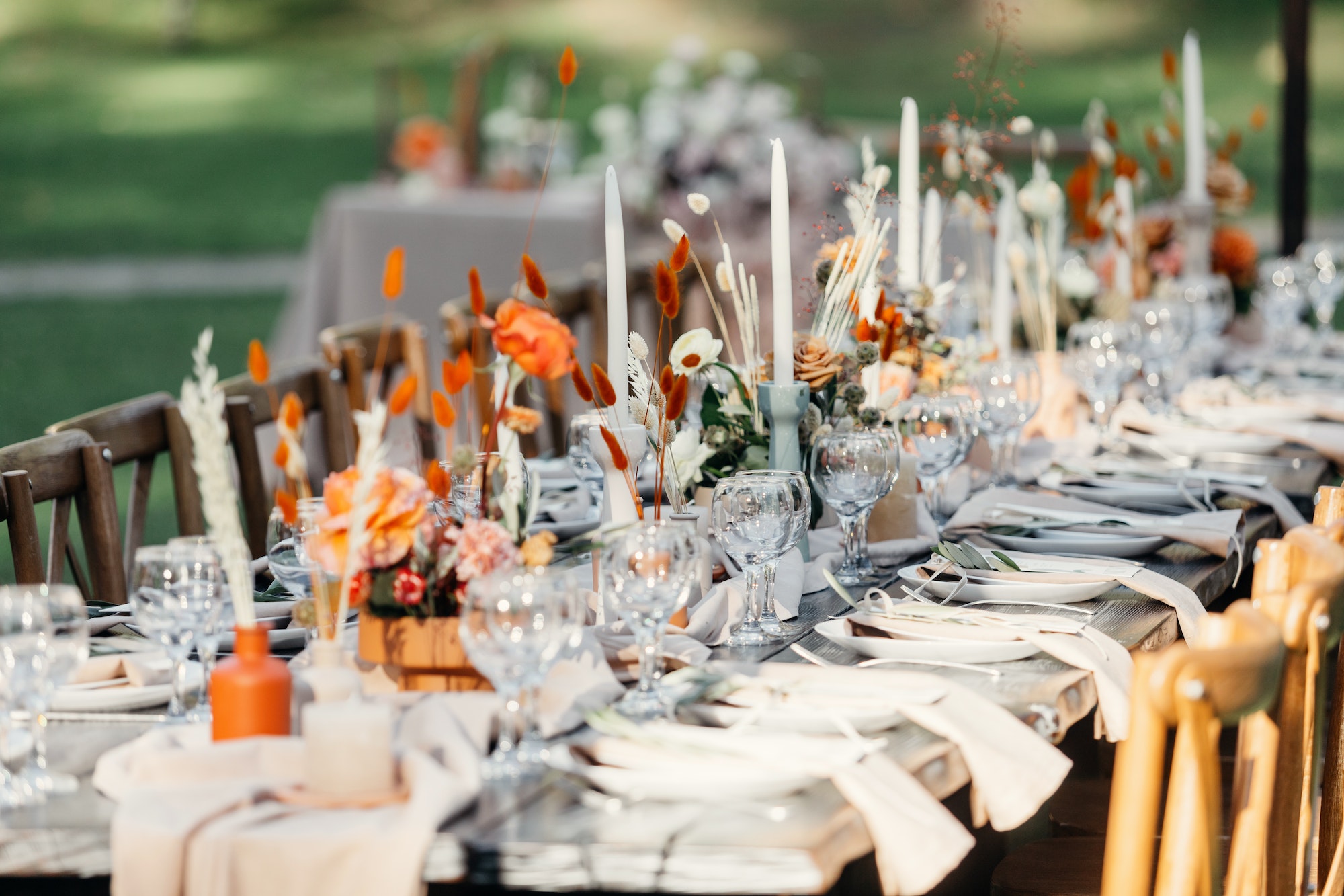 Luxury wedding reception, dining table setup with decoration on rustic wooden table